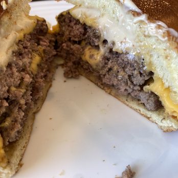 Fleur STL - Burger cut in half. - Breakfast & Brunch Near Me - St. Louis, Missouri Fleur STL - Burger cut in half. - Breakfast & Brunch Near Me - St. Louis, Missouri