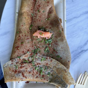 Cafe Voltaire - Galette with salmon, goat cheese, egg, confit onions, and caper - Coffee & Tea Near Me - Gainesville, Florida