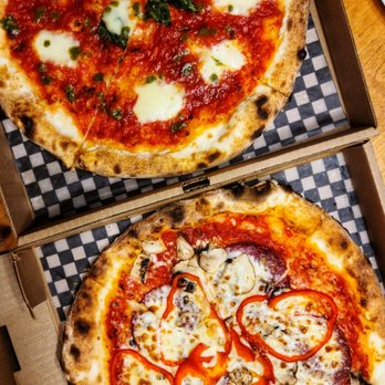 Station Pizza Moderne - Up : Margherita pizza Down : Classica (a.k.a. all-dressed) - Italian Near Me - Montreal, Quebec