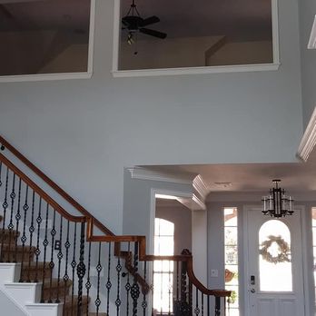 Empire Painting DFW - a staircase leading to the second floor - Painters Near Me - Arlington, Texas Empire Painting DFW - a staircase leading to the second floor - Painters Near Me - Arlington, Texas