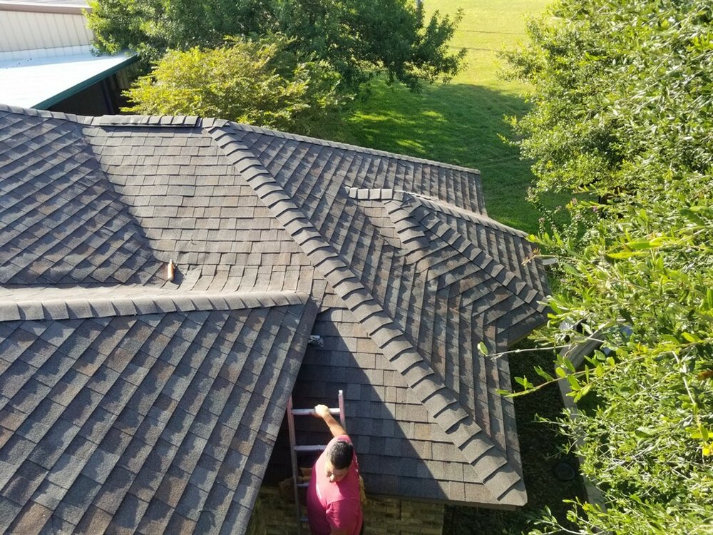 Slide of Monumental Roofing Services