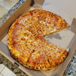 a half eaten pizza in a box