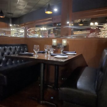 Divieto Ristorante - Estero - Across from the empty booth throughout our whole meal - Italian Near Me - Estero, Florida Divieto Ristorante - Estero - Across from the empty booth throughout our whole meal - Italian Near Me - Estero, Florida