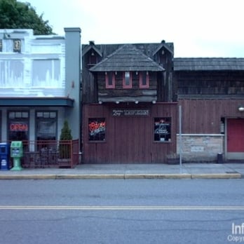 The Rollin Log Tavern - the outside of the building - Pubs Near Me - Issaquah, Washington The Rollin Log Tavern - the outside of the building - Pubs Near Me - Issaquah, Washington