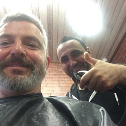 Caspian Barber - Bajo is a perfectionist for a great shave and a cut.