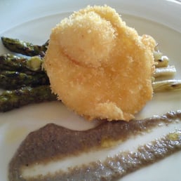 crispy poached hen's egg, grilled asparagus, mushroom puree and truffle oil. crispy poached hen's egg, grilled asparagus, mushroom puree and truffle oil.