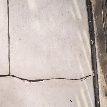 Lukes Landscaping and Hardscaping - There were 3 cracks that formed on my porch. This is the one right above the steps. What it looks like as of today. - Landscaping Near Me - Cleburne , Texas Lukes Landscaping and Hardscaping - There were 3 cracks that formed on my porch. This is the one right above the steps. What it looks like as of today. - Landscaping Near Me - Cleburne , Texas