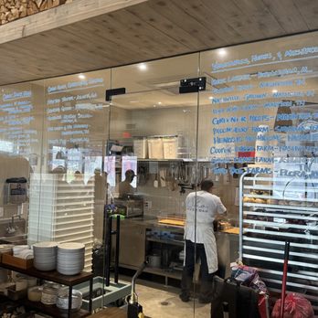 Sho Pizza Bar - The glass-enclosed "laboratory-like" clean-room for dough proofing and prep. - Pizza Near Me - Nashville, Tennessee Sho Pizza Bar - The glass-enclosed "laboratory-like" clean-room for dough proofing and prep. - Pizza Near Me - Nashville, Tennessee