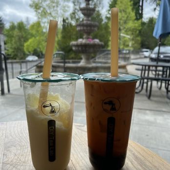 Boba Blast at Mill Creek - The piña colada on the left and the Thai iced tea on the right. Fountain in the background. The view from our table. - Bubble Tea Near Me - Mill Creek, Washington Boba Blast at Mill Creek - The piña colada on the left and the Thai iced tea on the right. Fountain in the background. The view from our table. - Bubble Tea Near Me - Mill Creek, Washington