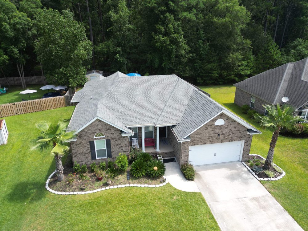 Slide of Talya Roofing