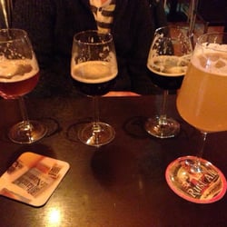 BQ - Sample flight of beers and a regular glass. Yum!