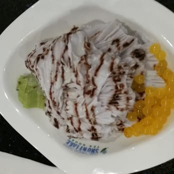 Snowflake Tea House - Taro shaved ice topped with condensed milk & chocolate, with mango popping boba & kiwi - Desserts Near Me - Duluth, Georgia Snowflake Tea House - Taro shaved ice topped with condensed milk & chocolate, with mango popping boba & kiwi - Desserts Near Me - Duluth, Georgia