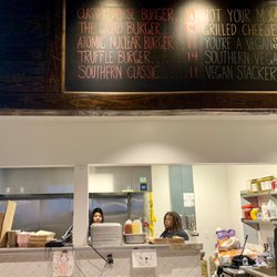 CowBar Burgers & Fries - Wall menu and counter