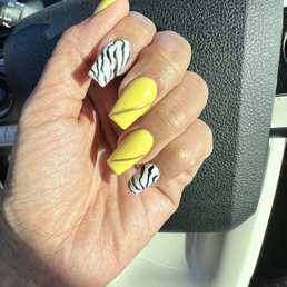Tai @icolor nails and spa