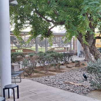 Palm Desert Library - For when the weather is cooperating, which is often, there is this exterior courtyard with that interesting sculpture of a giraffe. - Libraries Near Me - Palm Desert, California