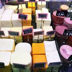 Riehl Deli & Cheese Shop - Sliced cheese, ribbon like cut, and wedges too.