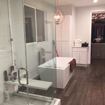 Hammer Construction - Walk in steam shower, with floating quartz bench, custom made bracket support. - General Contractors Near Me Hammer Construction - Walk in steam shower, with floating quartz bench, custom made bracket support. - General Contractors Near Me