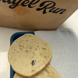 That black thing was a piece of black latex/nitrile glove cooked into the dough That black thing was a piece of black latex/nitrile glove cooked into the dough