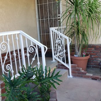 Ramos Iron works - Stair rails in white with some deco - Fences & Gates Near Me Ramos Iron works - Stair rails in white with some deco - Fences & Gates Near Me