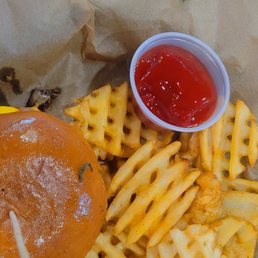Fries and a burger. The Waffle Fries were cooked perfectly. Fries and a burger. The Waffle Fries were cooked perfectly.