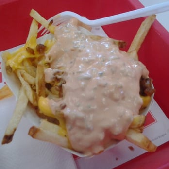 In-N-Out Burger - These are Animal Fries. They're not mentioned on the menu board since customers have hovered over this in informal gestures. It's saucy! - Fast Food Near Me - Laughlin, Nevada In-N-Out Burger - These are Animal Fries. They're not mentioned on the menu board since customers have hovered over this in informal gestures. It's saucy! - Fast Food Near Me - Laughlin, Nevada
