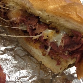 Dom's Sausage - Hot pastrami with provolone and onion in a bulkie - Meat Shops Near Me - Malden, Massachusetts