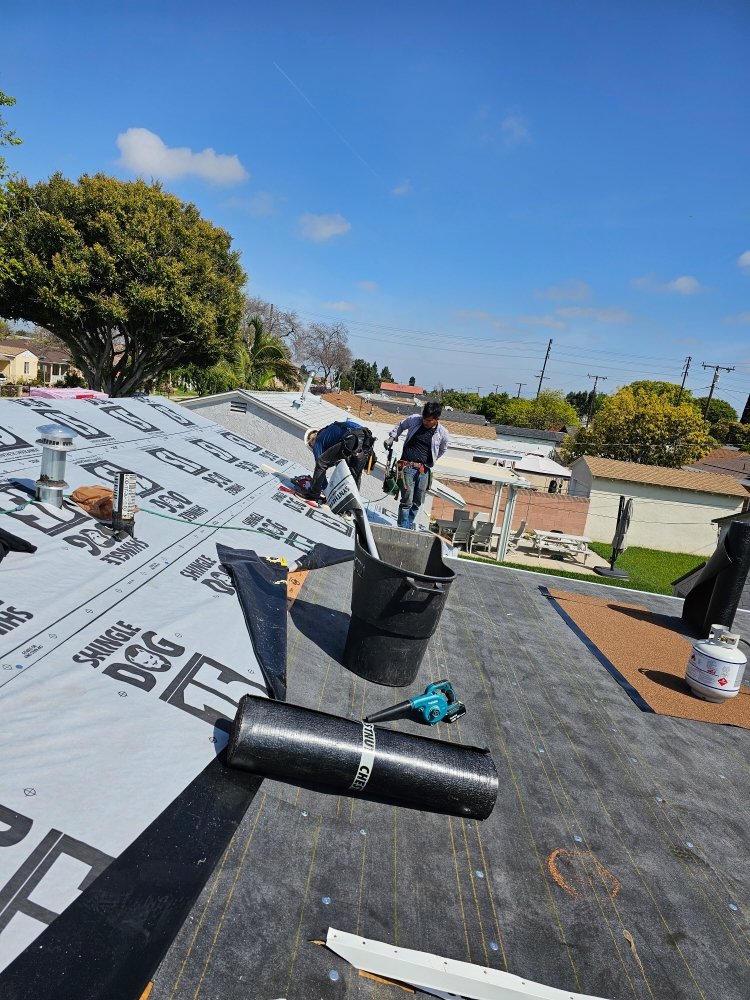 Slide of Juniors Roofing
