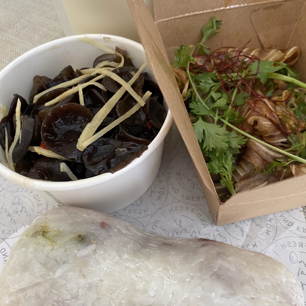 Regular sticky rice roll, yuzu wood eared mushrooms, spicy garlic pig ears, and regular soymilk