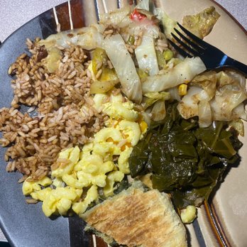 Mama's Caribbean Grill - Veggie plate (taken out of the box) - rice & peas, cabbage, veggie patty, macaroni & cheese, collards. - Caribbean Near Me - Charlotte, North Carolina
