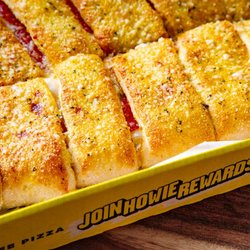 Our Pepperoni Stuffed Howie Bread is filled with pepperoni, mozzarella & cheddar cheese.