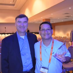 Home Services Group - Jaime Naranjo (Jimmy Orange) with DIRECTV's CEO, Mr. Mike White after been awarded as the best west coast DIRECTV Authorized Dealer