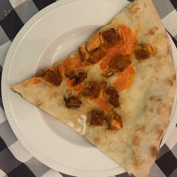 Pakulas Pizza - Pizza bread with a few pieces of chicken and a tiny bit of Buffalo sauce - Pizza Near Me - New City, New York Pakulas Pizza - Pizza bread with a few pieces of chicken and a tiny bit of Buffalo sauce - Pizza Near Me - New City, New York
