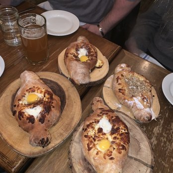 Cheeseboat - 3 truffle cheeseboat hachapuris & one brie cheeseboat topped with walnuts - Georgian Near Me - Brooklyn, New York