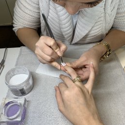 My is the best at doing all nail designs!! She is working on a custom flower acrylic design for my birthday. My is the best at doing all nail designs!! She is working on a custom flower acrylic design for my birthday.