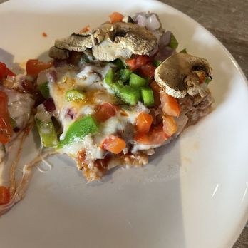 Roca Bar - Round the World pizza - Pizza Near Me - Evansville, Indiana