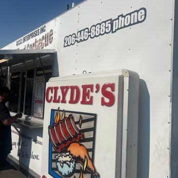 Clyde's Southern - a man standing in front of a food truck - Barbeque Near Me - Renton, Washington
