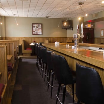 Ovalon Bar & Grill - a row of chairs at the bar - Italian Near Me - Hazleton, Pennsylvania Ovalon Bar & Grill - a row of chairs at the bar - Italian Near Me - Hazleton, Pennsylvania