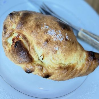 Superkhana International - Butter chicken calzone - Indian Near Me - Chicago, Illinois Superkhana International - Butter chicken calzone - Indian Near Me - Chicago, Illinois