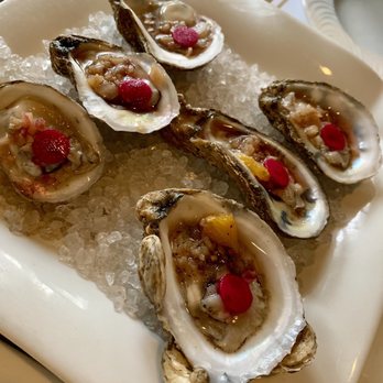 Verandah - Oysters with orange mignonette and pickled radish. - Seafood Near Me - Amelia Island, Florida Verandah - Oysters with orange mignonette and pickled radish. - Seafood Near Me - Amelia Island, Florida