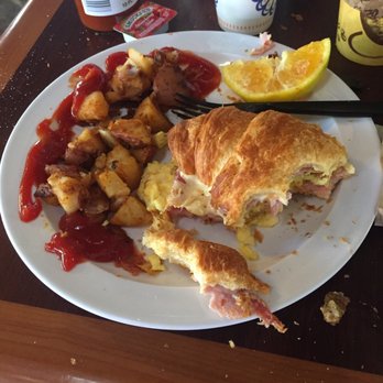Orange Inn - Ham, cheese and egg croissant $10.95 - Breakfast & Brunch Near Me - Laguna Beach, California Orange Inn - Ham, cheese and egg croissant $10.95 - Breakfast & Brunch Near Me - Laguna Beach, California