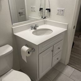 The replacement vanity and TP holder.