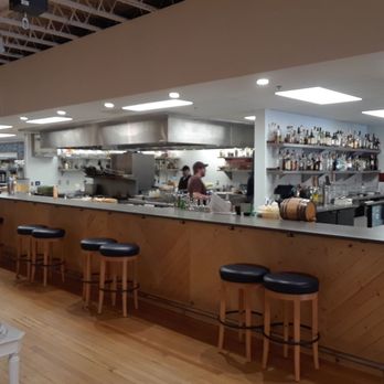 Leader - Open kitchen and bar counter, taken from doorway into mercantile store. - Women's Clothing Near Me - Cambridge, Minnesota