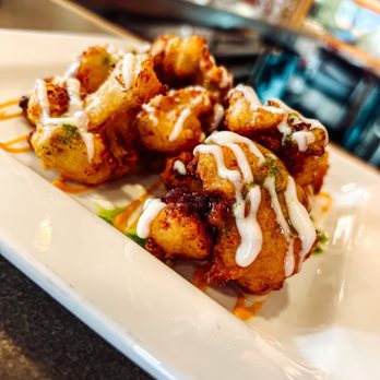 Rincón 38 - a plate of fried food - Tapas/Small Plates Near Me - Minneapolis, Minnesota Rincón 38 - a plate of fried food - Tapas/Small Plates Near Me - Minneapolis, Minnesota