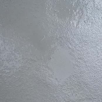 American Concrete Coatings - a closeup of a wet surface - Flooring Near Me - Arlington, Texas American Concrete Coatings - a closeup of a wet surface - Flooring Near Me - Arlington, Texas