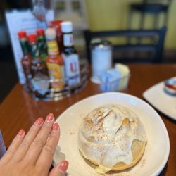 JJ's Caffe - This Large Fresh Baked Cinnamon Roll was so delicious and only 5.99! I ate it all.