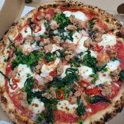 Pizzeria Via Napoli - CASARECCIA - 20  Crushed San Marzano tomatoes, house-made sausage, rapini, fior di latte, basil, garlic, preserved chilis