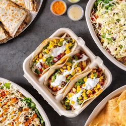 DosBros - Taco dreams and quesadilla cravings come true! Fresh, vibrant Mexican flavors topped with creamy guac and spicy sides. Dig in!