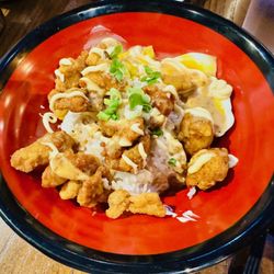 Issei Noodle - D5 Chicken Karaage-Don ($16 as of 05/2024).  This is fried chicken pieces, soft-boiled egg, and corn, over white rice.