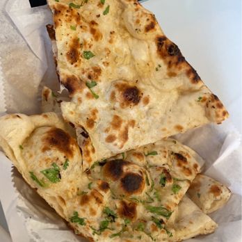 Baingan Indian Cuisine - Garlic Naan Bread - Indian Near Me - Shelton, Connecticut Baingan Indian Cuisine - Garlic Naan Bread - Indian Near Me - Shelton, Connecticut