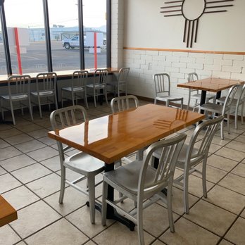 ABQ Burrito - a table and chairs in a restaurant - Mexican Near Me - Albuquerque, New Mexico